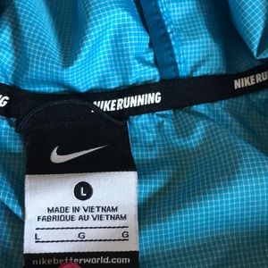 Nike ladies L running style jacket!! Nice blue !!